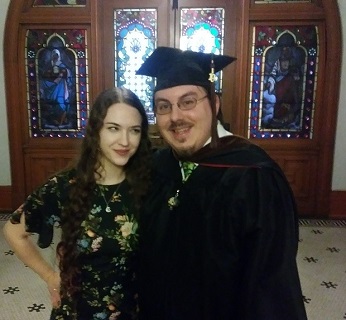 Jeremiah and his fiancee post-graduation